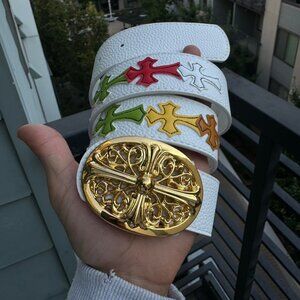 gold cross belt buckle with a multicolored crosses